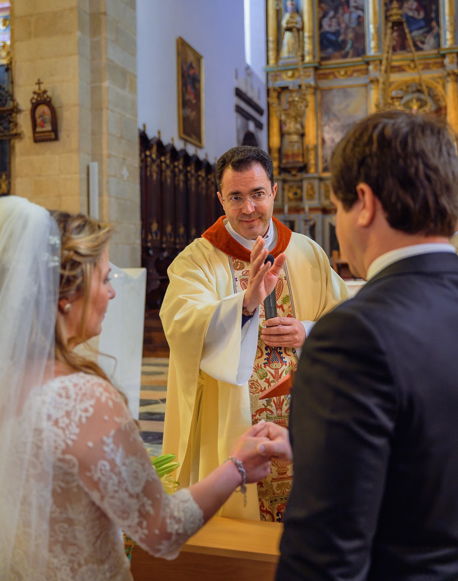 Classical portrait of the bride and groom in the cloister